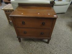 MID-20TH CENTURY OAK FRAMED TWO DRAWER CHEST WITH RINGLET HANDLES