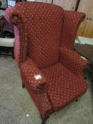 GOOD QUALITY RED UPHOLSTERED WING FIRESIDE CHAIR ON BEECHWOOD EFFECT LEGS