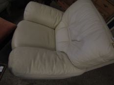 TWO CREAM LEATHER ARMCHAIRS