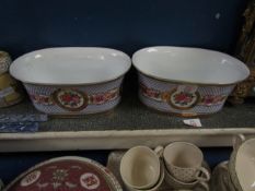 PAIR OF ROSE AND CO OVAL PORCELAIN PLANTERS WITH PAINTED FLORAL DECORATION AND GILDED RIMS