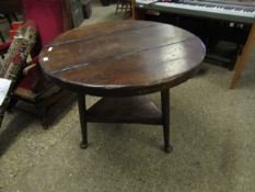 GOOD QUALITY RUSTIC OAK CIRCULAR TOP PUT TYPE TABLE RAISED ON THREE PAD FEET