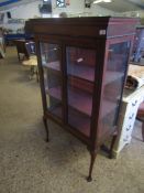 EDWARDIAN MAHOGANY TWO GLAZED DOOR DISPLAY CABINET ON FOUR PAD FEET