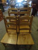 SET OF SIX BEECHWOOD HARD SEATED LADDER BACK KITCHEN CHAIRS COMPRISING FOUR DINING CHAIRS AND TWO