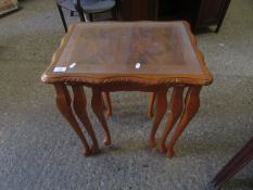 REPRODUCTION YEW WOOD NEST OF THREE TABLES WITH GLASS TOP ON CARVED LEGS