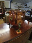 BRASS AND COPPER CAULDRON WITH LION HEAD HANDLES