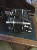 GOOD QUALITY EBONISED AND SILVER PAINTED PIANO ACCORDION