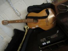 A FOUR-PIECE CLARINET AND ACOUSTIC GUITAR AND CASE (2)