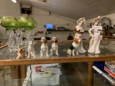 GROUP OF MOULDED MID-20TH CENTURY FIGURES COMPRISING TWO LADIES AND FIVE VARIOUS DOGS INCLUDING