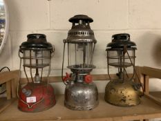 THREE VARIOUS HURRICANE LAMPS VIZ TWO TILLEY LAMPS AND ONE ANCHOR