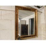 RECTANGULAR MIRROR IN ORNATE GILT FINISHED FRAME, APPROX 66 X 85CM