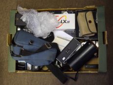 Large box of various camera equipment includes Zenit camera, Roniflex X3000 camera, various