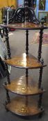 Victorian four tier bow fronted corner whatnot, each shelf inlaid with an urn design, 146cm high