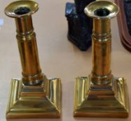 Pair of copper candlesticks circa late 18th/early 19th century, plain cylindrical stems and
