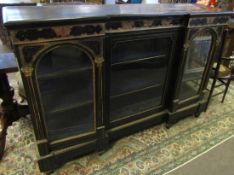 Victorian ebonised credenza of rectangular break front form, front fitted with three glazed doors