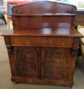Victorian mahogany chiffonier with arched back over a shelf, lower section with full width drawer