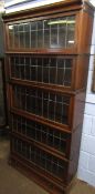Oak Globe Wernicke style bookcase of five glazed sections with drawer below, each with leaded