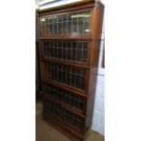 Oak Globe Wernicke style bookcase of five glazed sections with drawer below, each with leaded