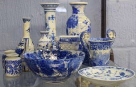 Group of 18th/19th century blue and white wares including some Continental porcelain candlesticks,