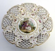 Meissen style Continental porcelain dish with reticulated borders and a pastoral scene to the
