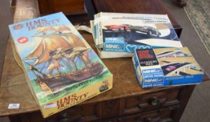Minic motor racing game and accessory pack, together with Airfix model HMS Bounty