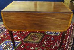 Early 19th century mahogany cross banded Pembroke table, typically fitted with two drop flaps and