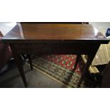 19th century mahogany card table, fold top over a plain frieze and raised on slightly tapering