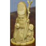 Early 20th century ivory model of an immortal, probably Shou Lao, 10cm high