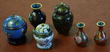Group of cloisonne wares including pair of small vases, vase with cover, bowl and cover and second