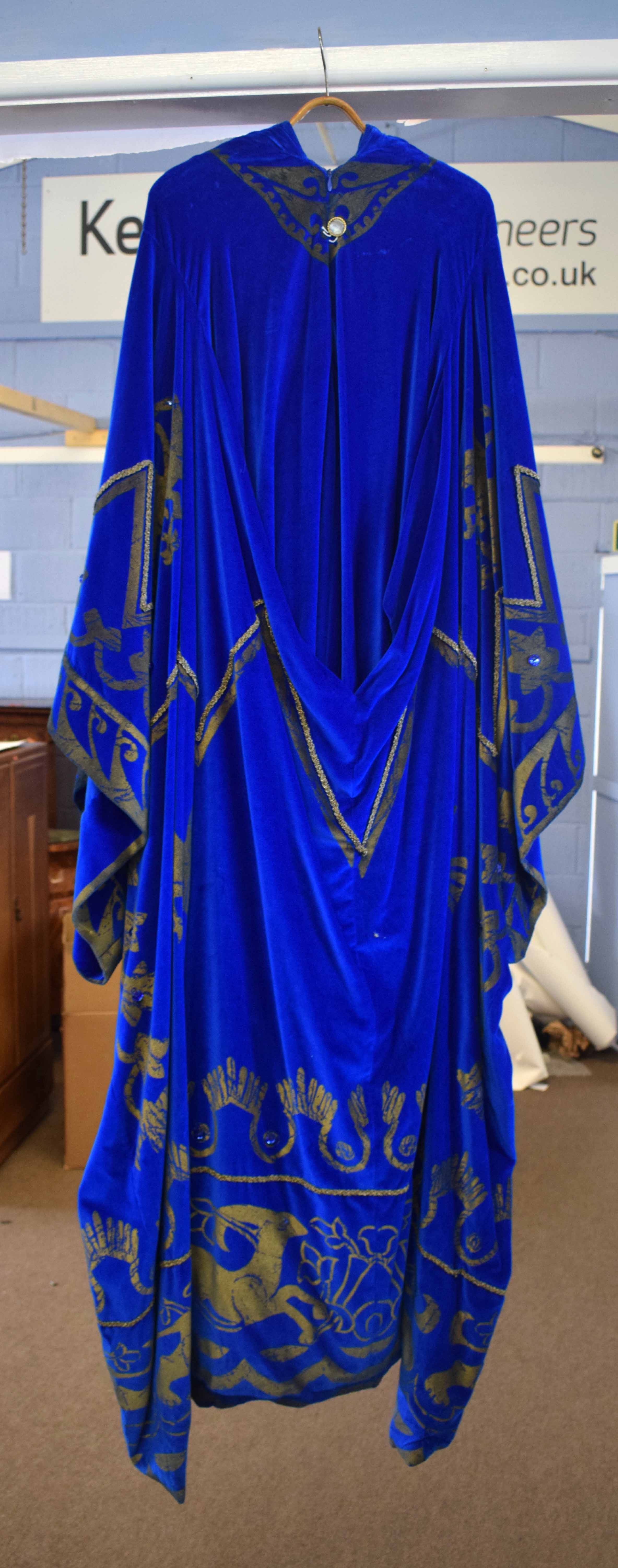 Oriental caped dress