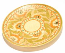 Crown Ducal charger decorated with an autumn leaf type pattern by Charlotte Rhead, 32cm diam