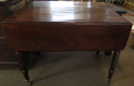 19th century mahogany Pembroke table with two drop flaps, one end frieze drawer, raised on twisted