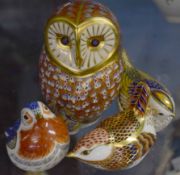 Group of four Royal Crown Derby paperweights with gold and silver stamps, modelled as birds, the owl
