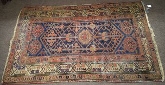 Vintage wool prayer rug, central panel of geometric lozenge triple gull border, mainly puce and blue