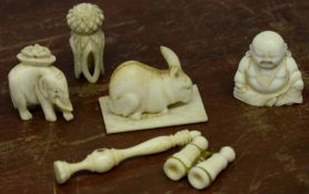 Small group of early 20th century ivory objects including a miniature pair of binoculars, model of