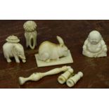 Small group of early 20th century ivory objects including a miniature pair of binoculars, model of