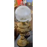 Victorian and later gilt metal mounted oil lamp with globular opaque shade, 65cm high