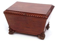 Early 19th century mahogany wine cooler of tapering rectangular form, the lifting lid with a