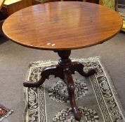 Victorian mahogany circular pedestal table, with wrythen and ring turned column terminating in a