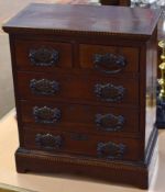 Late 19th/early 20th century apprentices chest applied with dentil inlaid ebonised and satinwood rim