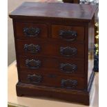 Late 19th/early 20th century apprentices chest applied with dentil inlaid ebonised and satinwood rim