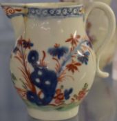 Lowestoft porcelain jug circa 1780, the barrel shaped body with a Redgrave style decoration of a