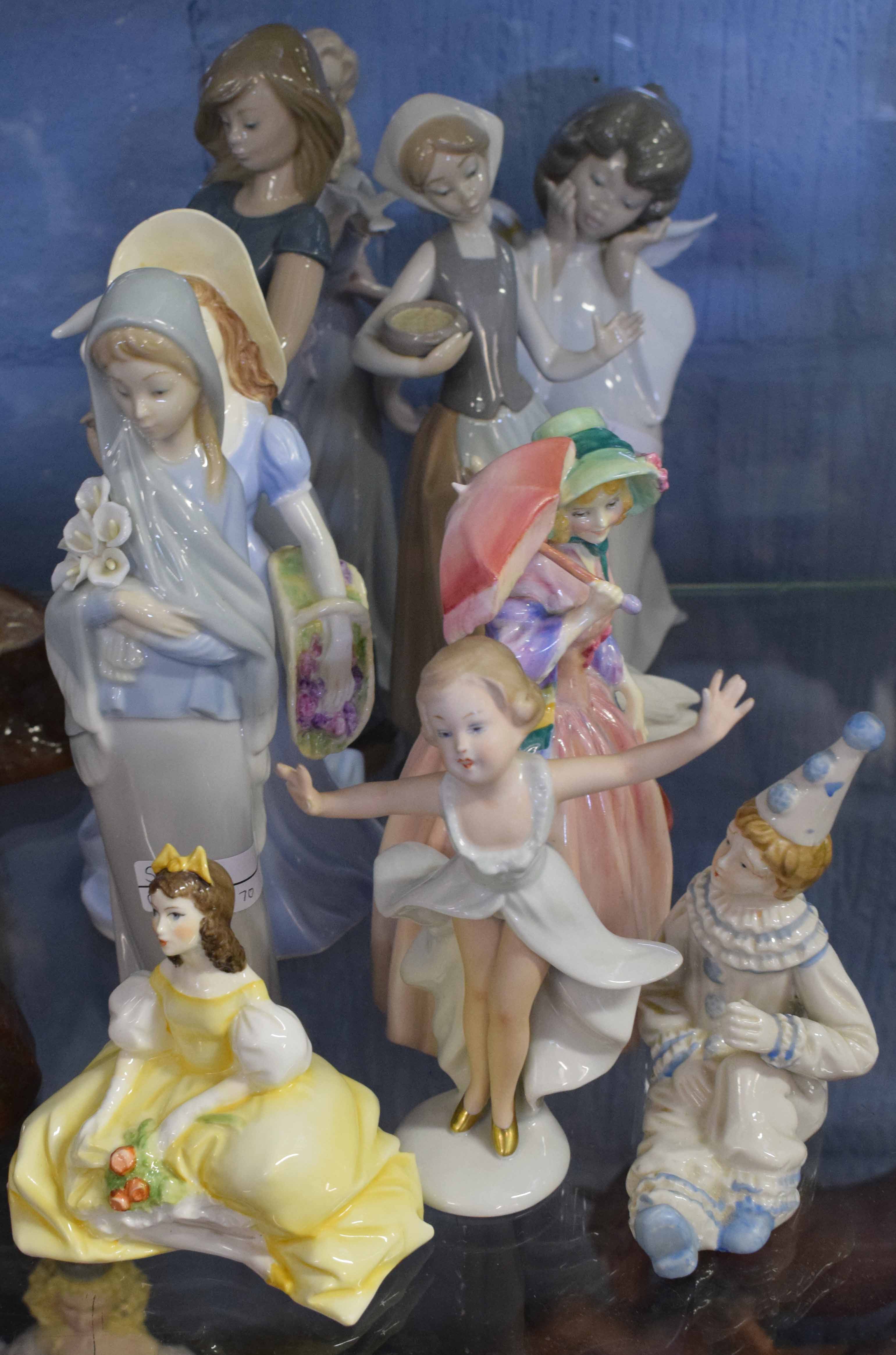 Group of porcelain figures, including Lladro figures of children, Royal Worcester figure of a