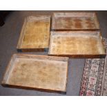 Set of four vintage pine and metal banded trays of rectangular form, bear traces of manufacturer/