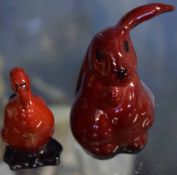 Two Royal Doulton flambe models one of a lop eared rabbit, the other of a duck, the rabbit 7cm