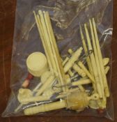 Bag containing various sewing implements with ivory handles and some assorted counters