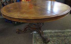 Victorian Pollard effect circular dining table with heavily moulded baluster support terminating