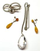 Mixed Lot: a crystal pear shaped faceted pendant suspended from a metal chain, pair of modern