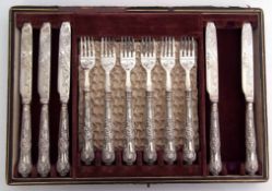 Cased silver handled Kings pattern dessert service comprising six dessert forks and five dessert
