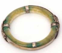 Jade type circular bangle, the surround applied with a metal dragon and mythological bird, 80mm diam
