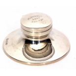 George V capstan inkwell, of typical circular form, the hinged cover with presentation engraving